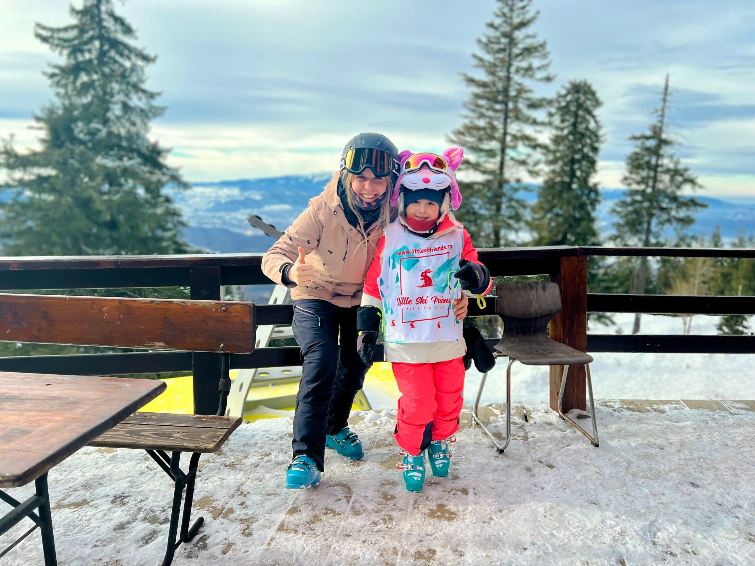 Instructor and child in a gondola